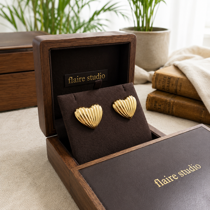 Flaire Studio ribbed gold heart stud earrings in jewellery box